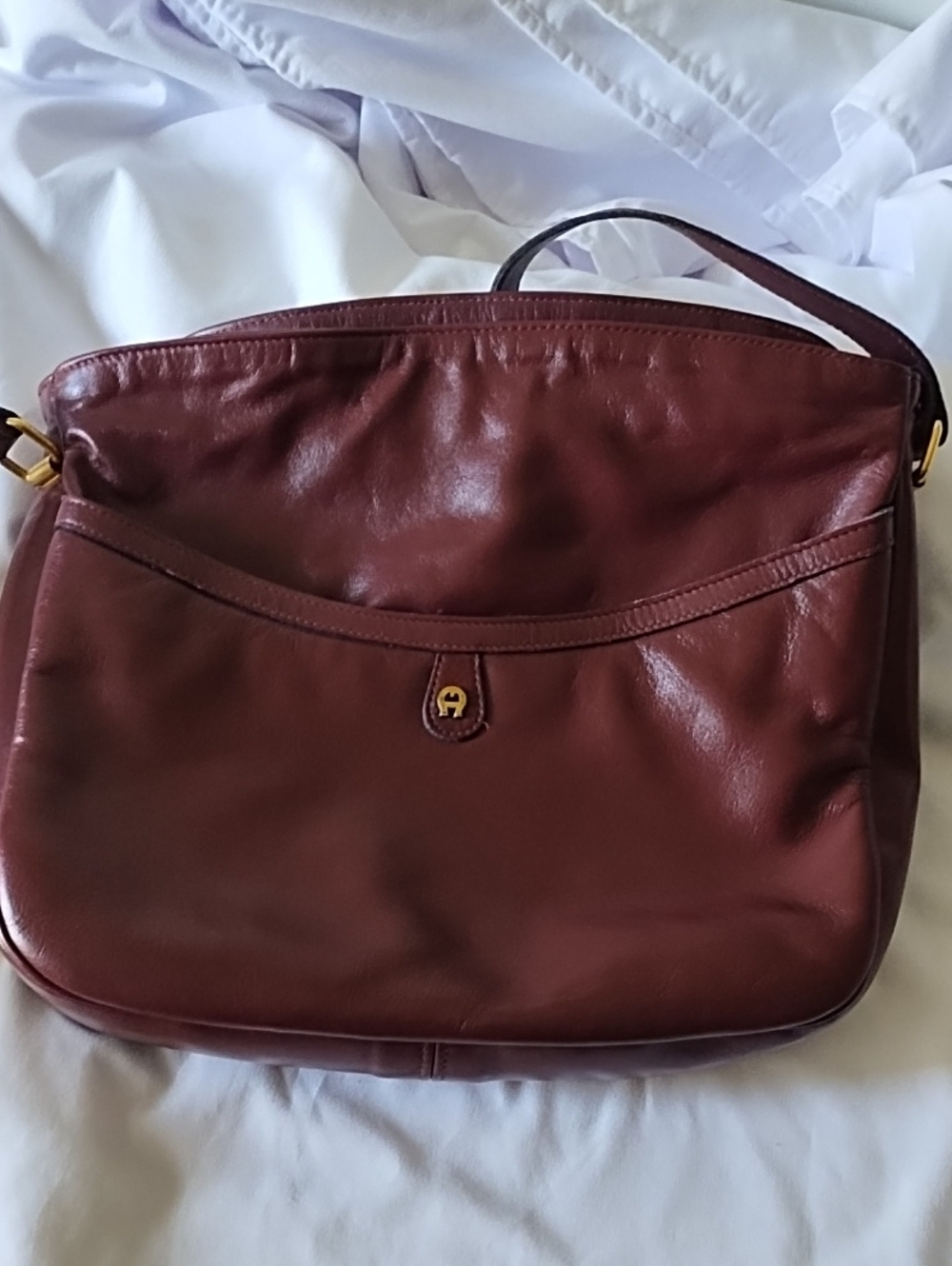 Etienne Aigner Burgundy shoulder bag with mirror